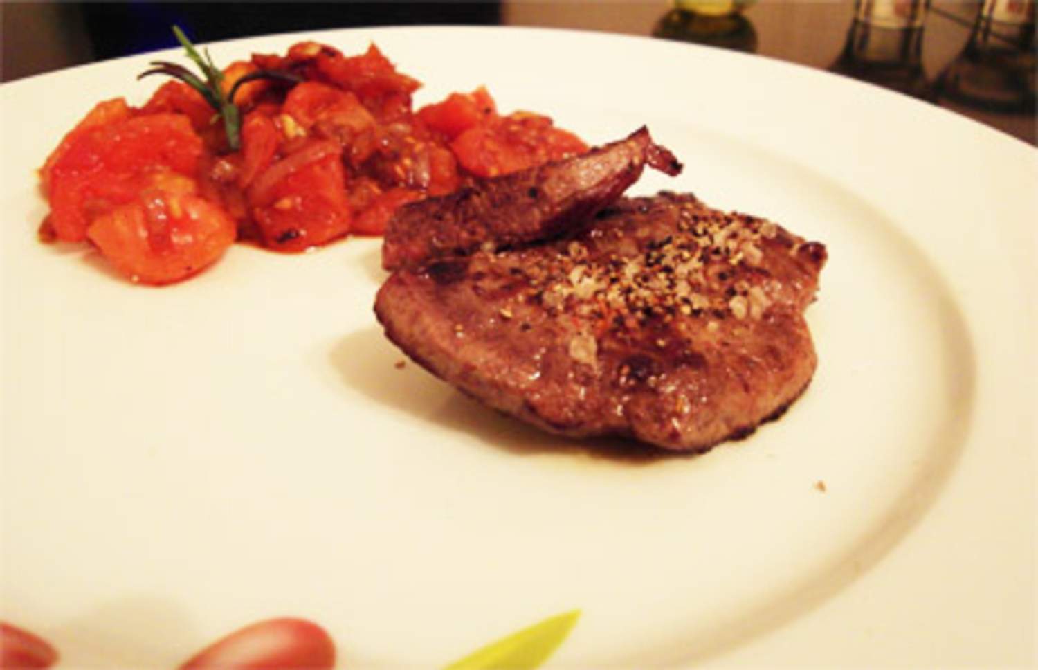 Rindersteaks mit Tomatensoße Bild