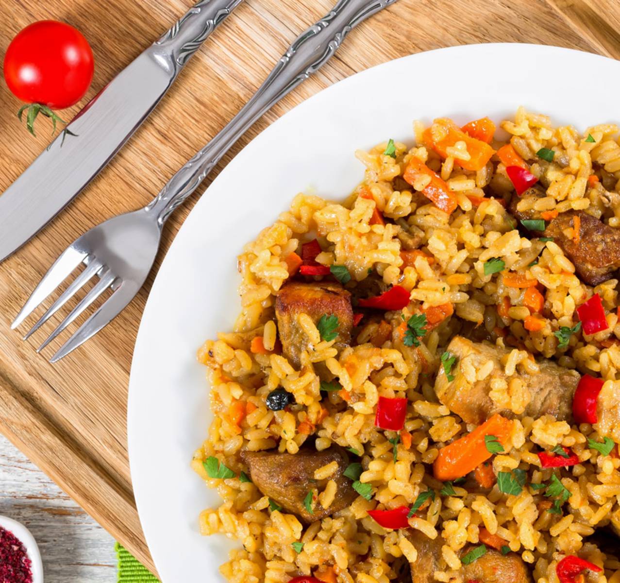 Reispfanne mit Schweine-Minutensteaks Bild